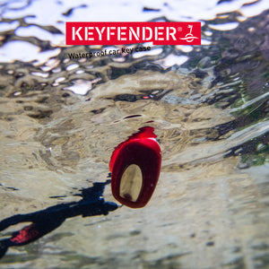 Keyfender floating on the silvery reflecting water surface photographed from below